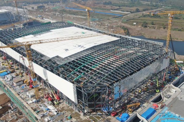 利配网 国内首个大跨度张弦木拱钢架混合结构场馆主体结构封顶